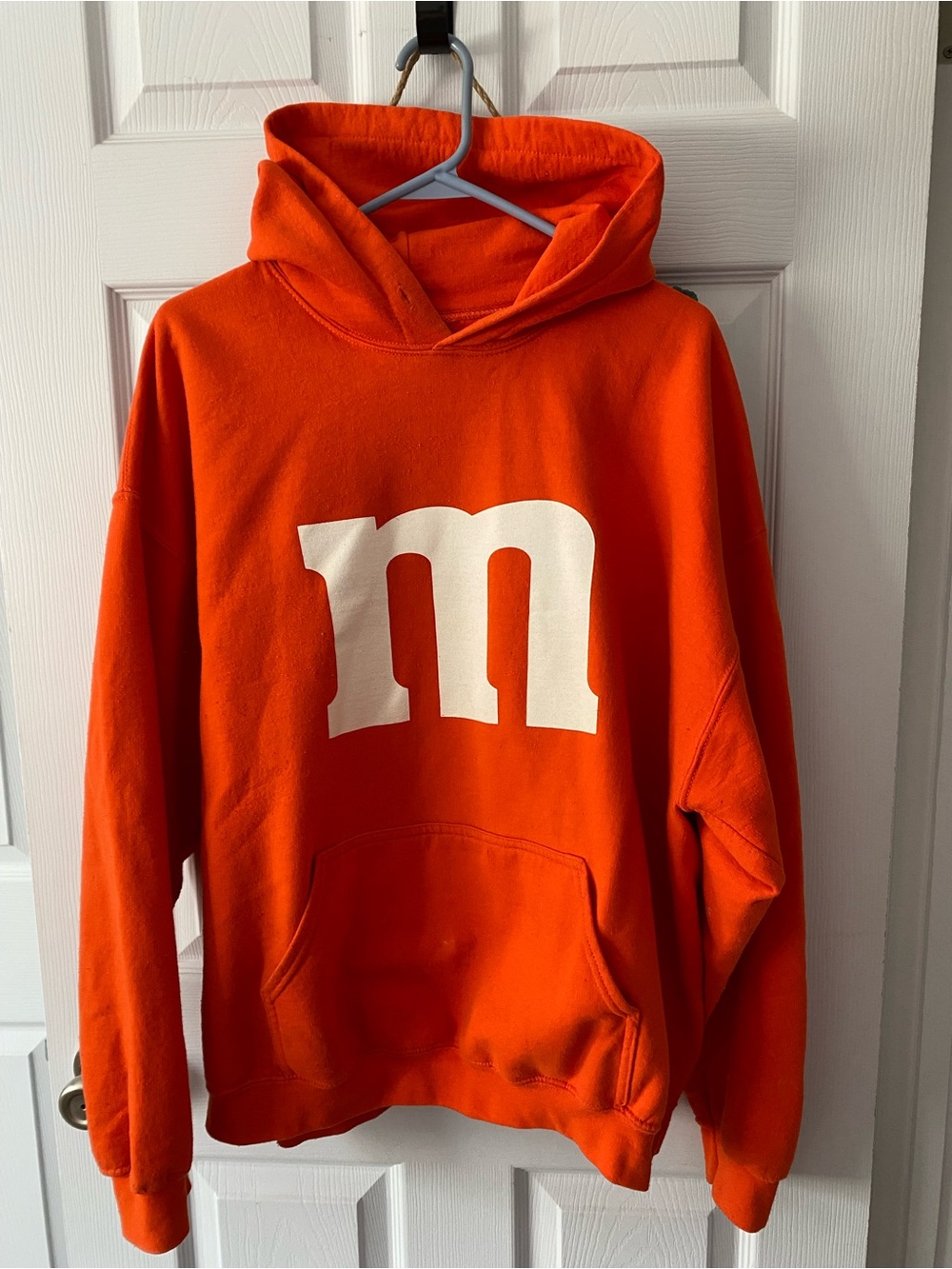 Orange Graphic Hoodie Sweatshirt with White 'm' Logo